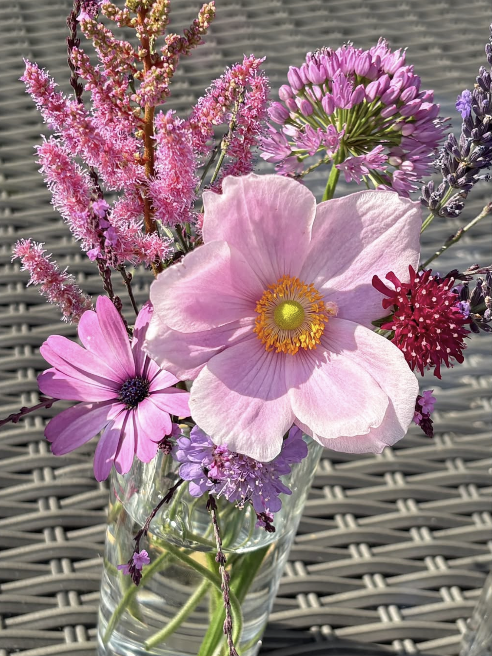 A modern, elegant white and green floral arrangement by Urban Bloom.
